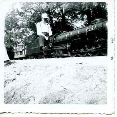 T Clarence Marshall trial running the 401 on the Auburn Valley Railroad, 1960