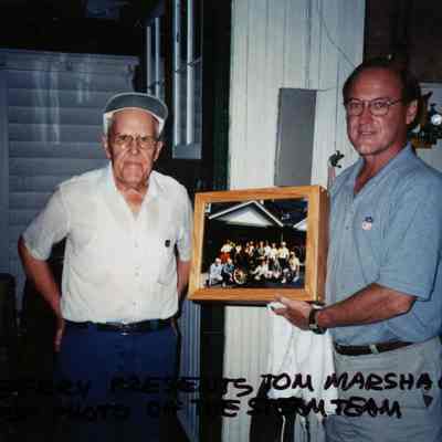 2000 - Alan Berry presents Thomas C. Marshall, Jr., with a photo of the Steam Team