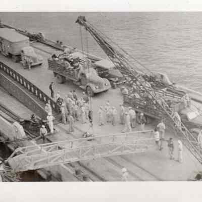 Loading trucks on pier