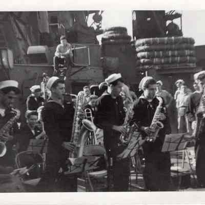 Saxophones playing standing