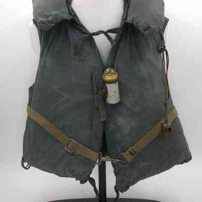 All components of kapok life jacket: Contains kapok (2024.1013.49.1) light (2024.1013.49.2) and whistle (2024.1013.49.3)