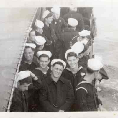 Sailors under awning