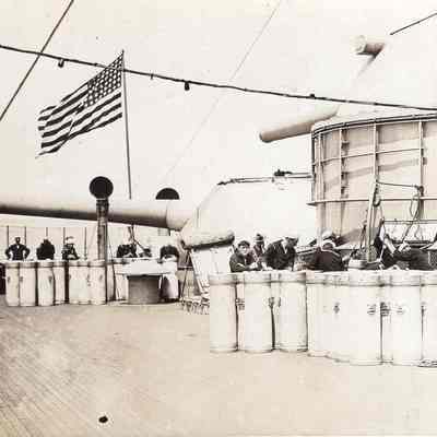 Men relax on stern
