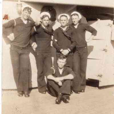 Sailors pose together