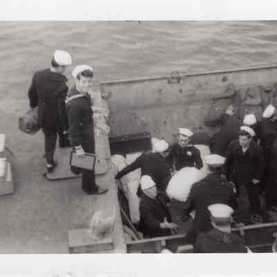 Sailors loading boat