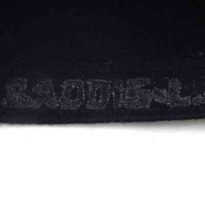 Gaddis's name on bottom of pant legs of 2025.1017.136