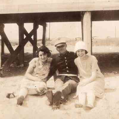 Marine with two women