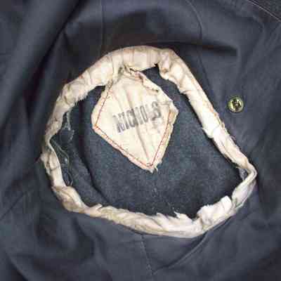 stencil on left arm hole of 2025.1028.18.1