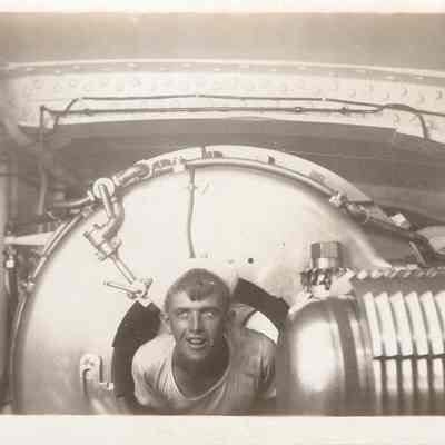 Sailor inside 14" gun breech