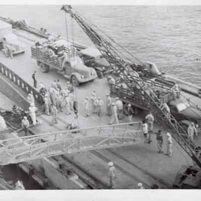 Loading trucks on pier duplicate
