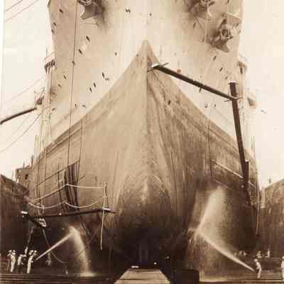 Crew wash bottom of hull