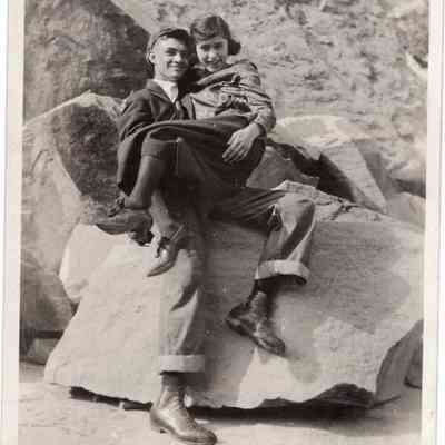 Man and woman on rock