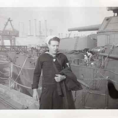 Sailor stands on wing wall duplicate
