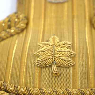 Gold maple leaf on 2025.1018.2.2