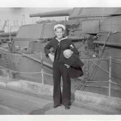 Sailor poses on wing wall duplicate
