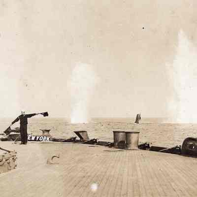 Flags waved on New York stern