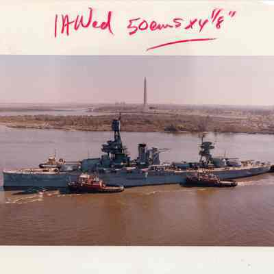 Texas towed by San Jacinto Monument