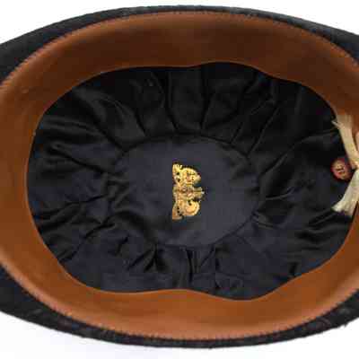 underside of 2025.1018.1: British Coat of Arms on interior
