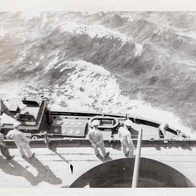 Sailors watch landing craft