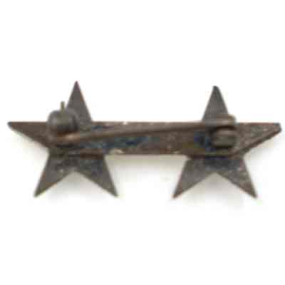 back of 2025.1010.2.1: Small notch in the metal to the left of the midway point, and just right of the left star(from back) marks 2025.1010.2.1