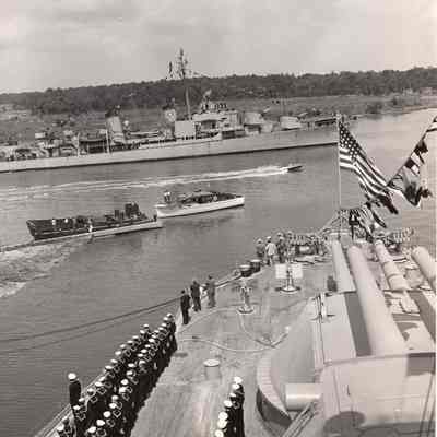 Destroyer Borie passes behind Texas' stern