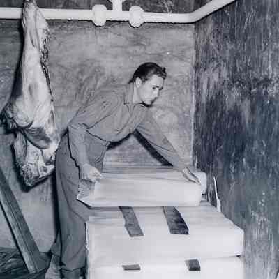Soldier working in meat locker