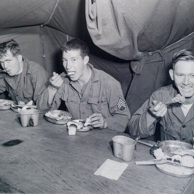 Soldiers eating in a mess tent