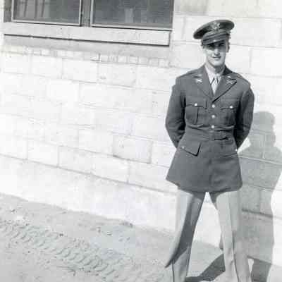 Officer standing outside barracks