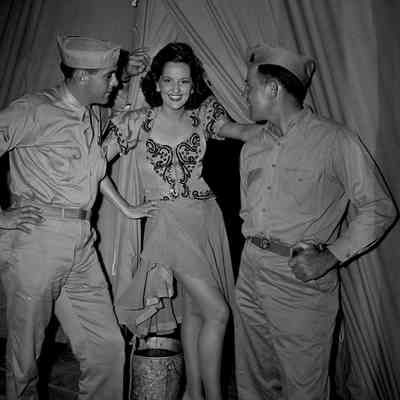 Soldiers with a showgirl