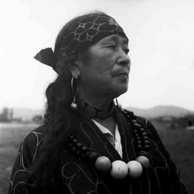 Ainu woman in traditional dress