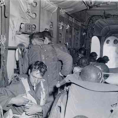 Paratroopers inside a C-119 aircraft