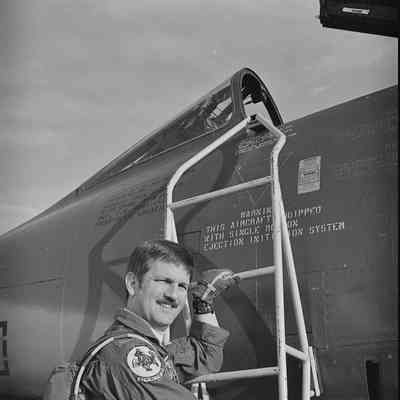 Pilot on cockpit ladder