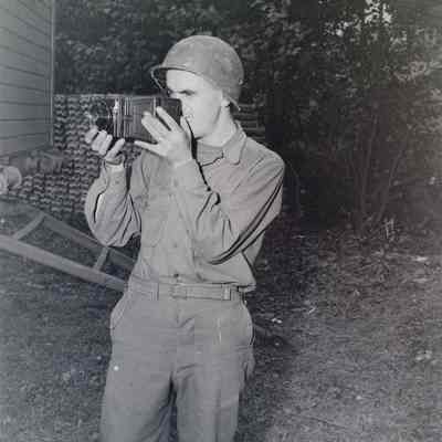 Soldier taking a photograph