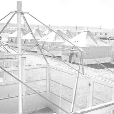 Ridged-wall tents under construction