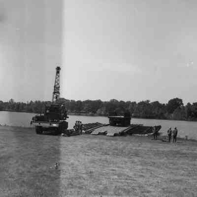 Truck parked on pontoon bridge section