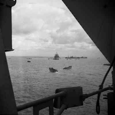 Landing craft maneuvering through transport ships