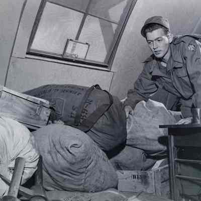 Soldier sorting bags and supplies