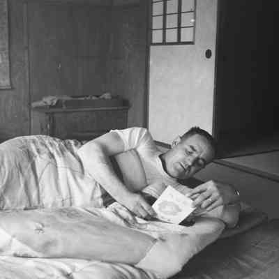 Soldier relaxing in a hotel room