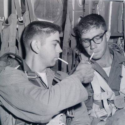 Paratroopers having a cigarette inside aircraft