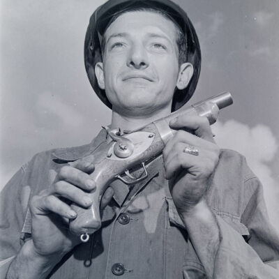 Soldier with antique pistol