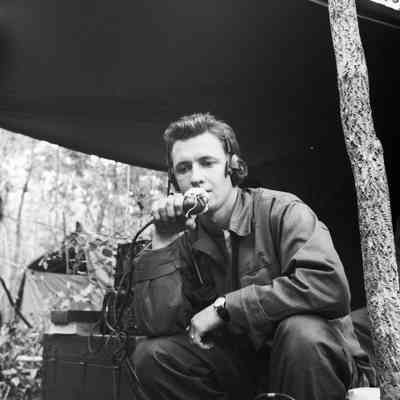 Soldier talking on field radio