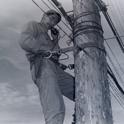 Soldier lineman on a pole