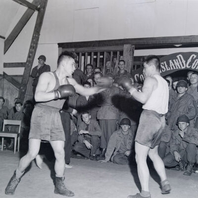 Soldiers watching a boxing match