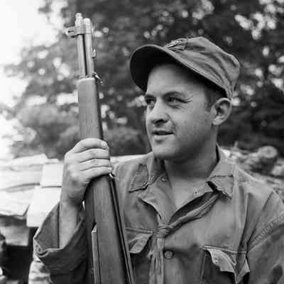 Soldier holding an M-1 rifle