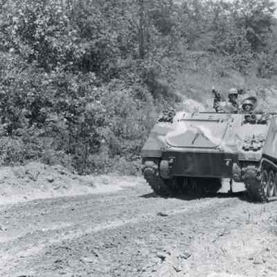 Soldiers driving M113