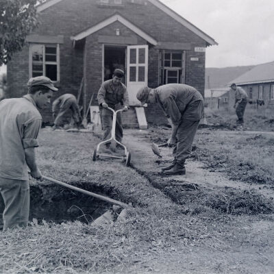 Soldiers doing yard work