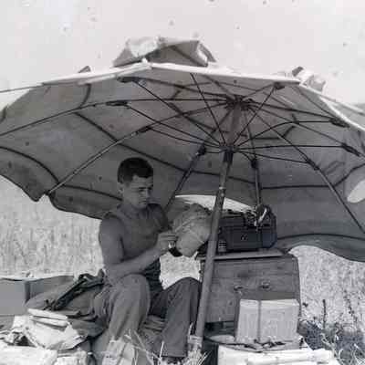 Soldier under umbrella
