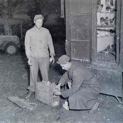 Private First Class Ralph Belhumeur and John Deverso with Pigeons