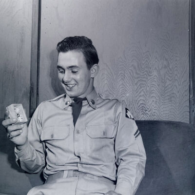 Soldier examining a toy box