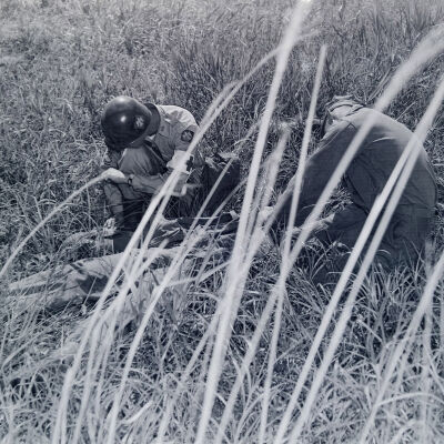 Medics working a wounded man